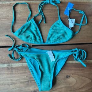 Green reversible triangle bikini top and low rise bottom.